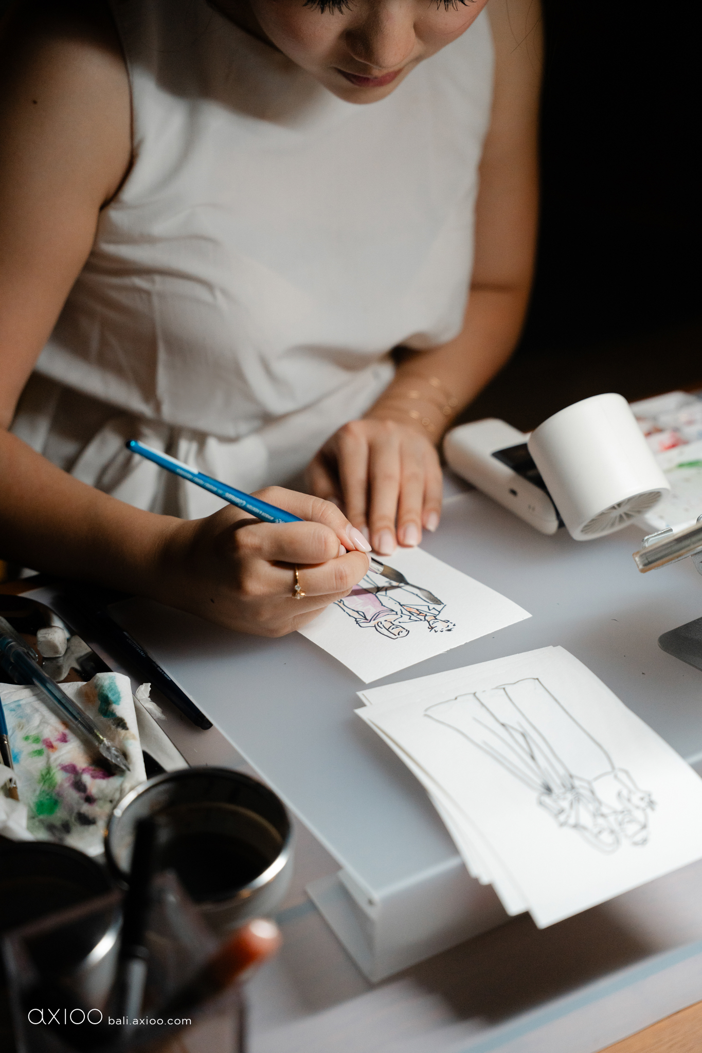 Axioo: Before the Shutter Clicks